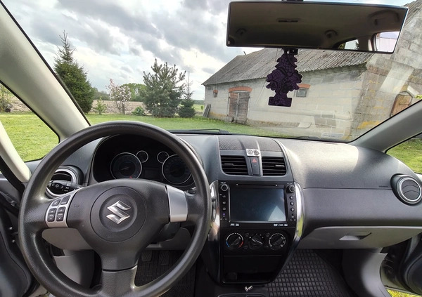 Suzuki SX4 cena 34500 przebieg: 135140, rok produkcji 2013 z Szczecinek małe 211